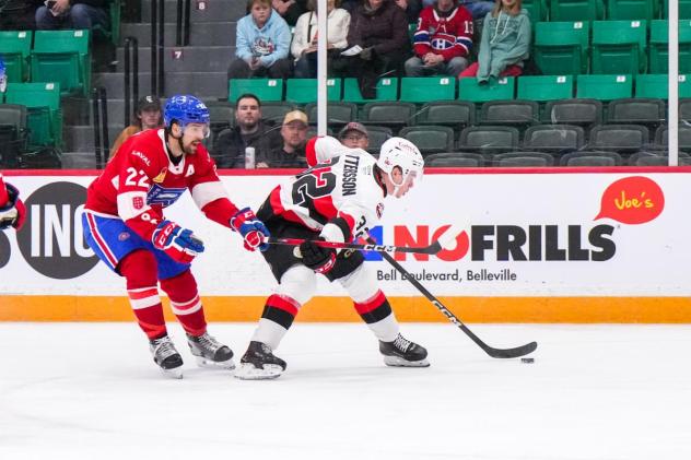Belleville Senators right wing Oskar Pettersson (right) vs. the Laval Rocket