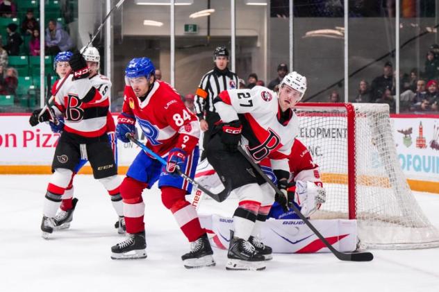 Belleville Senators center Keean Washkurak (right) stands watch vs. the Laval Rocket