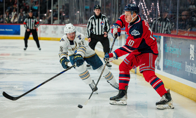 Springfield Thunderbirds center Chris Wagner (left) vs. the Hartford Wolf Pack
