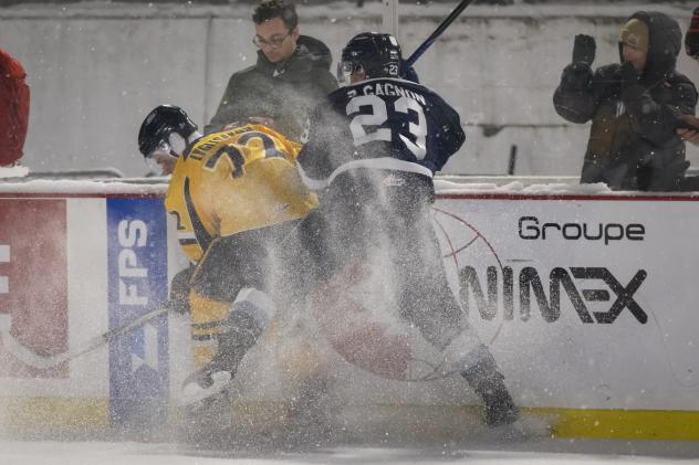 Shawinigan Cataractes left wing Chad Lygitsakos (left) vs. the Sherbrooke Phoenix
