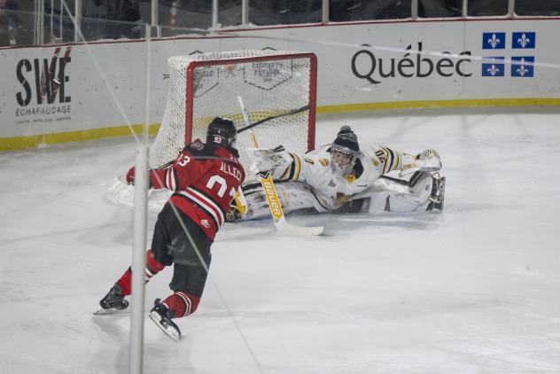 Drummondville Voltigeurs left wing Jesse Allecia fires a shot against the Victoriaville Tigres