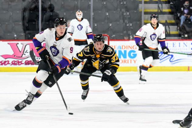 Wheeling Nailers forward Connor Lockhart (center) vs. the Reading Royals