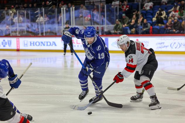 Syracuse Crunch forward Brendan Furry vs. the Utica Comets