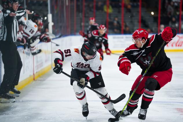 Rapid City Rush forward Quinn Olson (left) vs. the Allen Americans