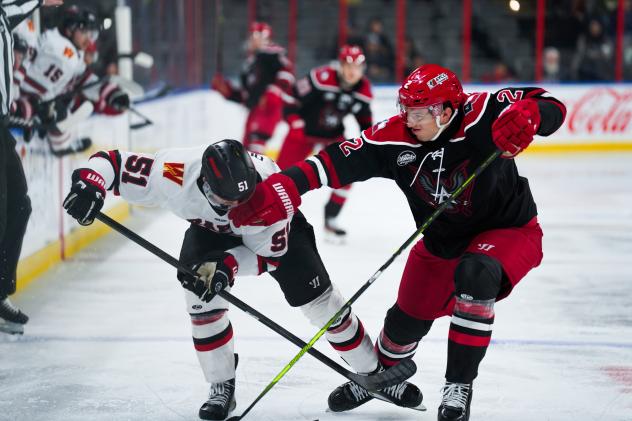 Allen Americans defenseman Anthony Costantini (right) vs. the Rapid City Rush