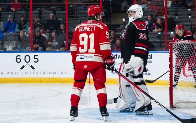 Rapid City Rush's Blake Bennett and Allen Americans' Marco Costantini on game night