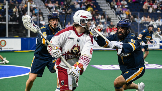 Oshawa Firewolves' Alex Simmons versus Georgia Swarm's Kason Tarbell and Mike Manly