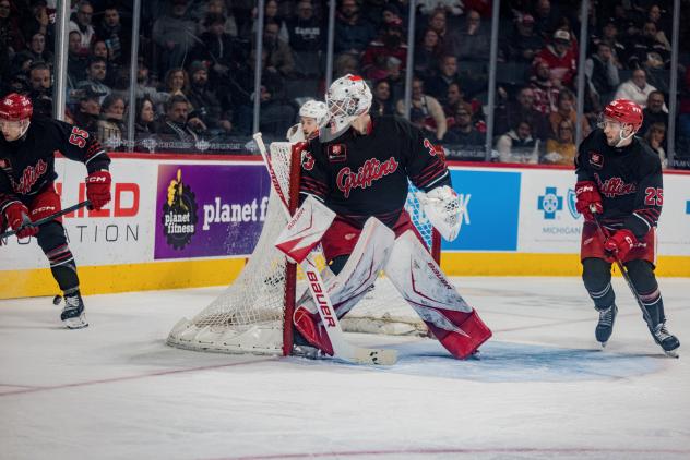 Grand Rapids Griffins' 	Ian Mitchell, Sebastian Cossa, and Ondřej Becher on game night
