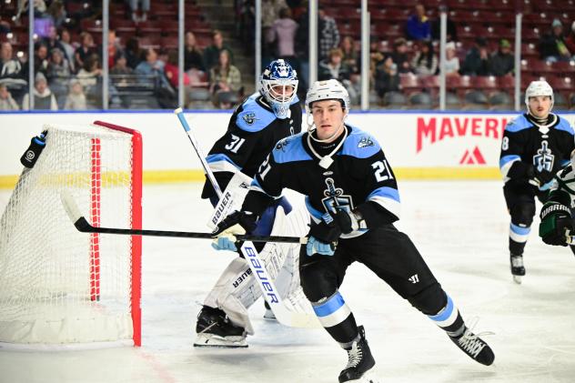 Atlanta Gladiators' Jack Matier (21), goalie Ethan Haider, and Ryan Conroy on game night