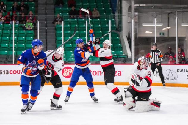 Belleville Senators goaltender Jackson Parsons and his defence vs. the Bridgeport Islanders