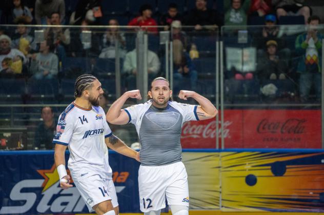 Tacoma Stars defender Nestor Hernandez (right) and forward Tyler John