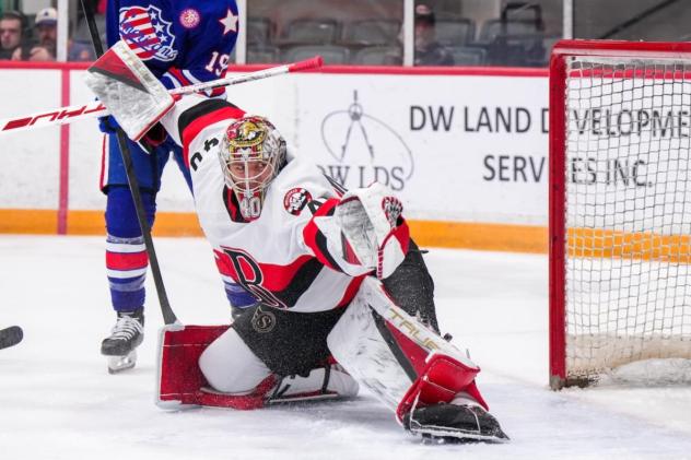 Belleville Senators goaltender Mads Søgaard sprawls to make a stop