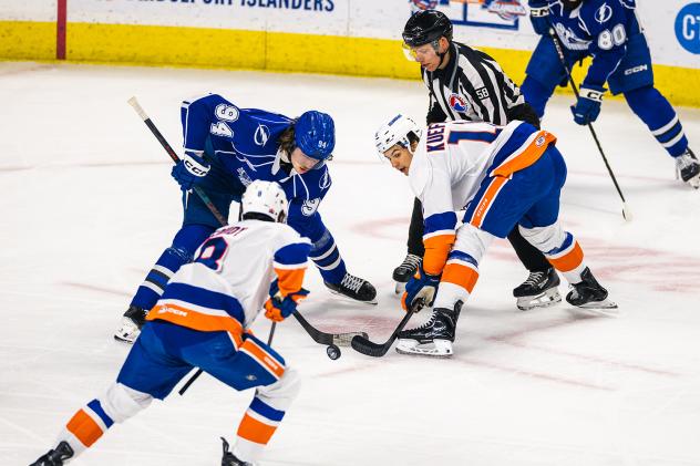 Syracuse Crunch forward Conor Geekie (top left) vs. the Bridgeport Islanders