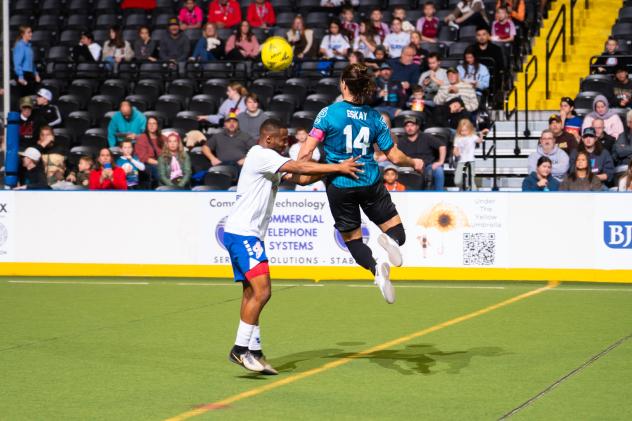 St. Louis Ambush midfielder William Eskay goes high vs. the Kansas City Comets