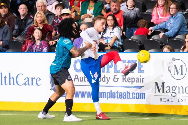 St. Louis Ambush defend against the Kansas City Comets