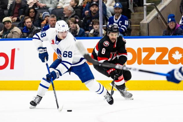 Belleville Senators right wing Mark Duarte (right) vs. the Toronto Marlies