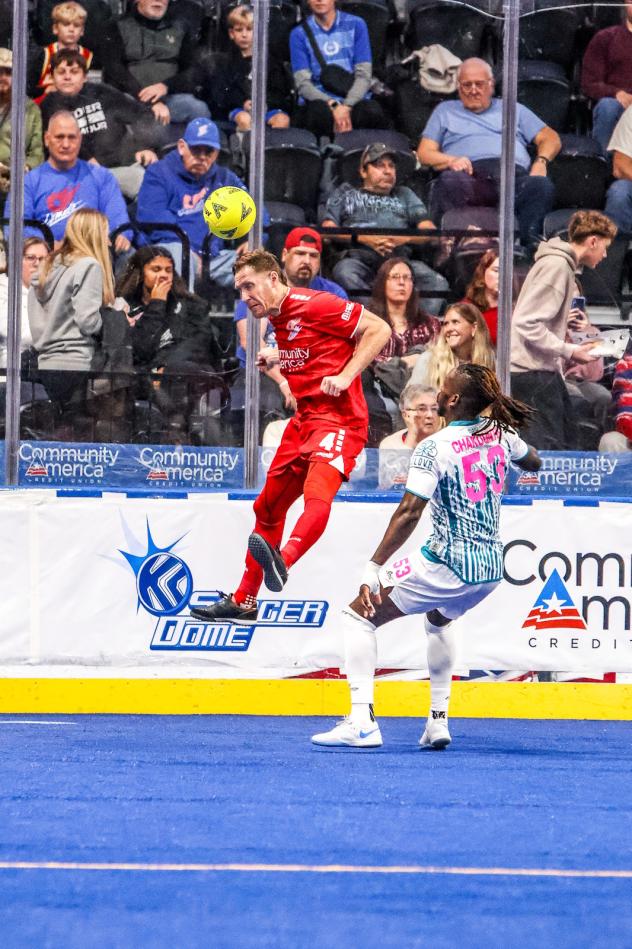 St. Louis Ambush forward Axel Chakounte (right) vs. the Kansas City Comets