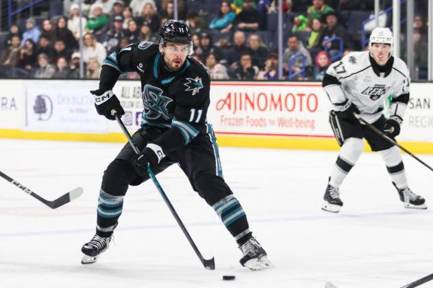 San Jose Barracuda's Yegor Afanasyev and Ontario Reign's Kenny Connors on the ice