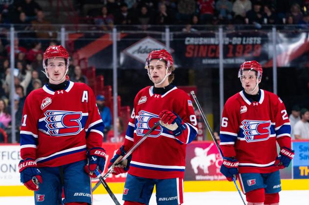 Spokane Chiefs' Owen Martin, Mathis Preston, and Chase Harrington