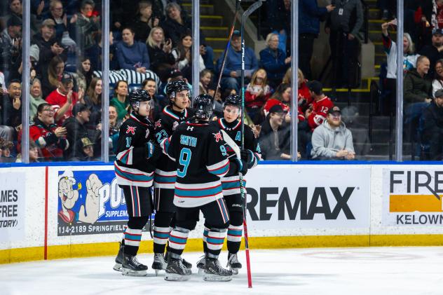 Kelowna Rockets huddle following a goal