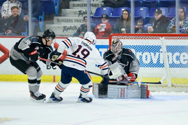 Vancouver Giants goaltender Burke Hood makes a stop against the Kamloops Blazers
