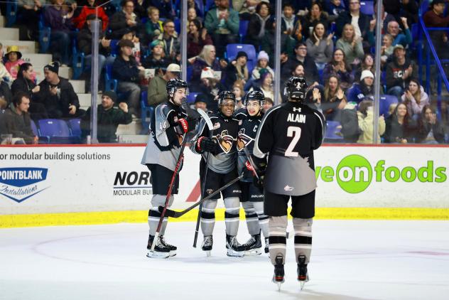 Vancouver Giants gather following a goal against the Kamloops Blazers