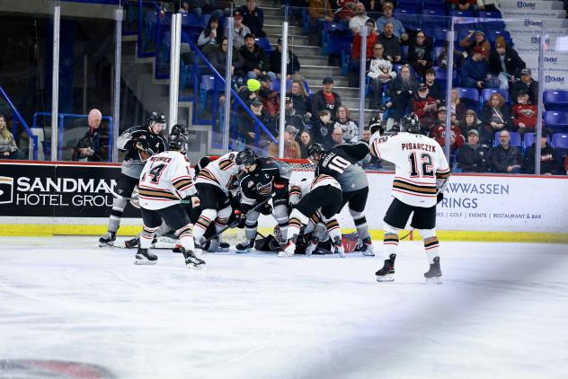 Vancouver Giants battle the Calgary Hitmen