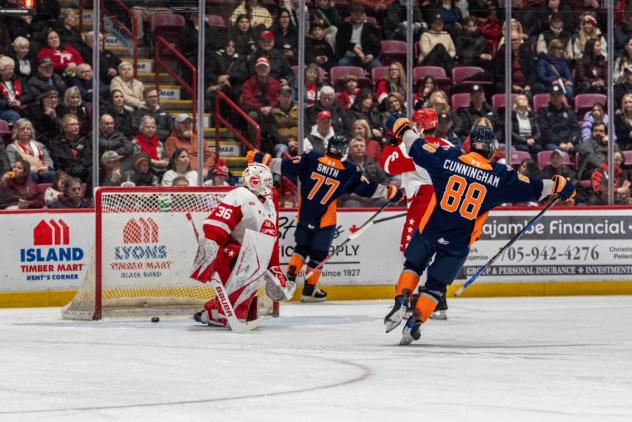 Ryland Cunningham and Brady Smith of the Flint Firebirds react after a goal