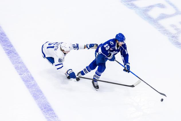 Syracuse Crunch forward Brendan Furry (right) vs. the Toronto Marlies