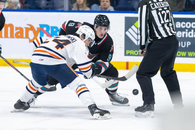 Kamloops Blazers' Ty Bonkowski versus Kelowna Rockets' Gabriel O'Brien