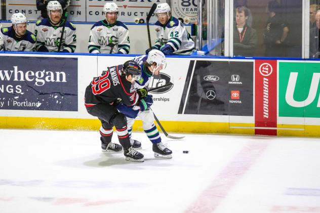 Adirondack Thunder forward Brannon McManus (left) vs. the Maine Mariners