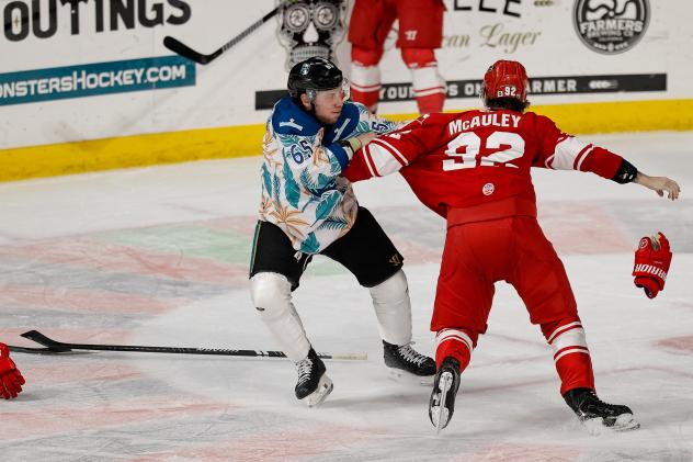 Colby McAuley of the Allen Americans fights with the Tahoe Knight Monsters