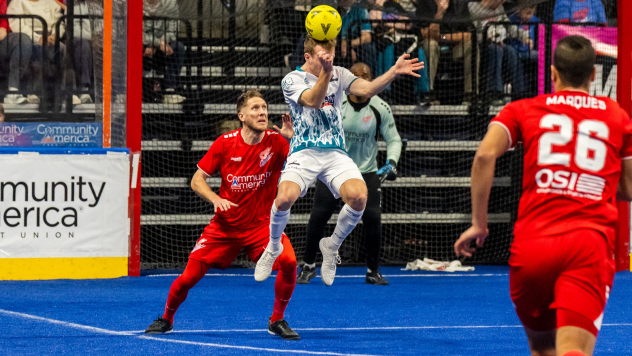 St. Louis Ambush go high for a ball against the Kansas City Comets