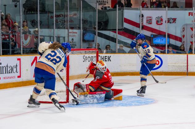 Vancouver Goldeneyes' Abby Boreen and Jen Gardiner versus Ottawa Charge's Gwyneth Philips
