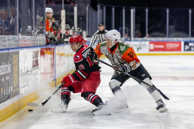 Allen Americans right wing Timofey Spitserov (left) vs. the Wichita Thunder