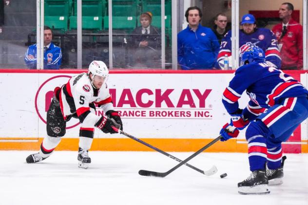 Belleville Senators centre Wyatt Bongiovanni (left) vs. the Rochester Americans