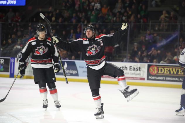 Maine Mariners, as the Portland Pirates, celebrate a goal