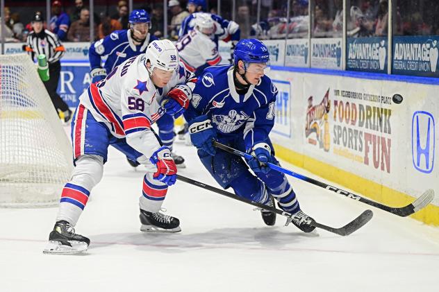 Syracuse Crunch center Tristan Allard (right) vs. the Rochester Americans