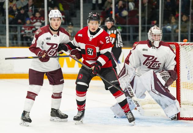 Peterborough Petes goaltender Masen Johnston and defenceman Garrett Frazer vs. the Ottawa 67's