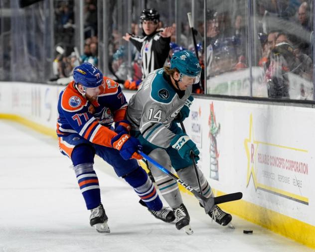 Bakersfield Condors' Luke Prokop battles San Jose Barracuda's Kasper Halttunen