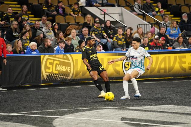 St. Louis Ambush defender John Gates (right) vs. the Milwaukee Wave