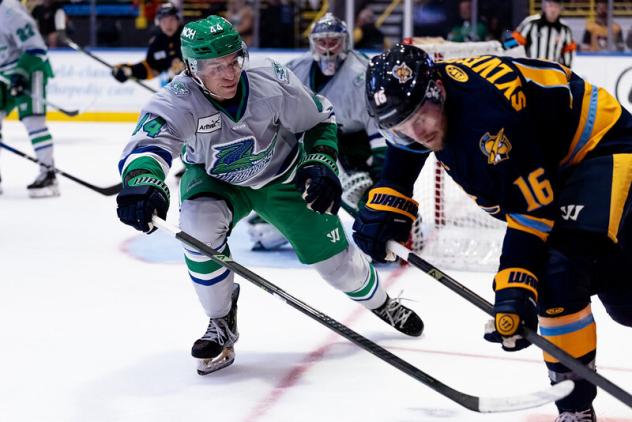 Florida Everblades defenseman Kurtis Henry (left) vs. the Atlanta Gladiators