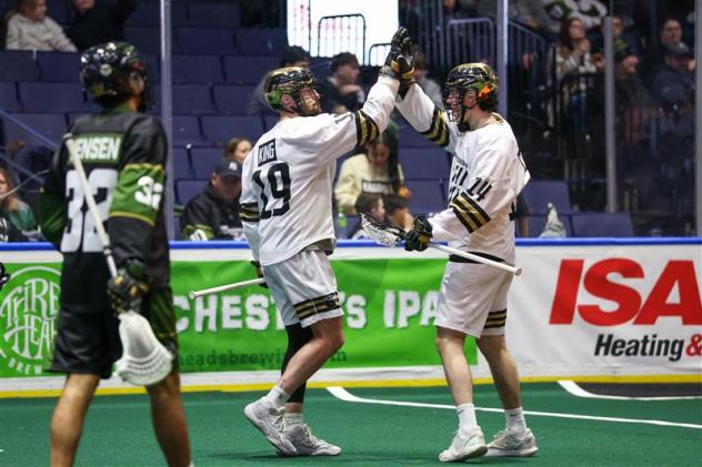 Vancouver Warriors' Jesse King and Marcus Kalrich and Rochester Knighthawks' Taylor Jensen on game night