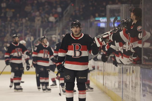 Belleville Senators hand out congratulations along the bench