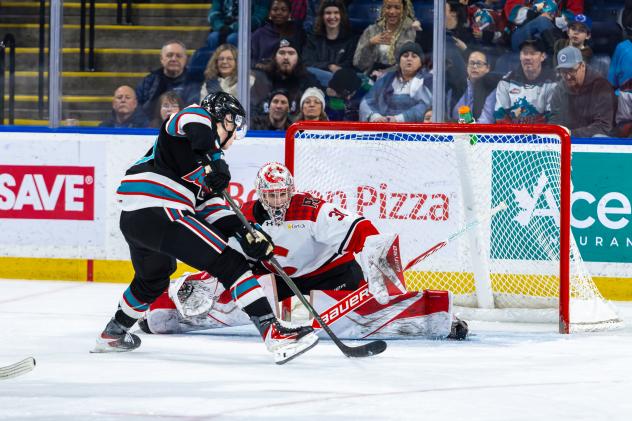 Kelowna Rockets look for a score against the Prince George Cougars