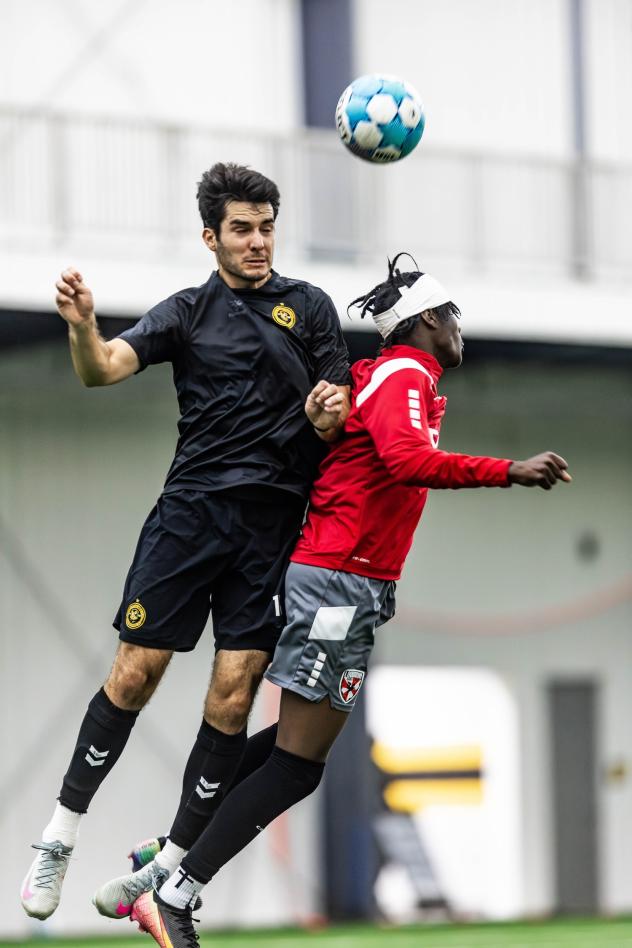 Beto Ydrach of Pittsburgh Riverhounds SC jumps to win a header