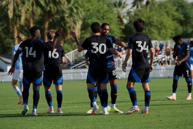 San Jose Earthquakes exchange congratulations after a goal against New York City FC at the 2026 Coachella Valley Invitational