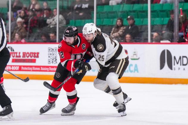 Belleville Senators centre Garrett Pilon (left) vs. the Hershey Bears