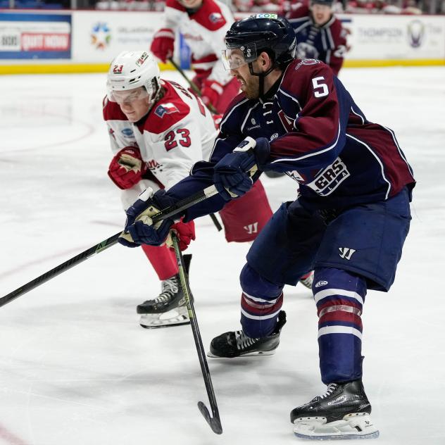 Allen Americans' Sam Sedley and Tulsa Oilers' Duggie Lagrone in action
