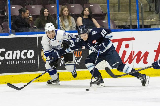 Victoria Royals' Landon Young versus Penticton Vees' Diego Johnson